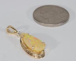 Fine Estate 14K Gold Diamond Solid Yellow Crystal Opal Pendant Fine Estate 14K Gold Diamond Solid Yellow Crystal Opal Pendant