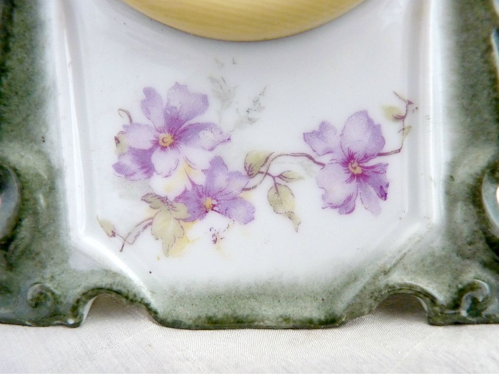 Antique German porcelain clock celluloid frame Wurttemberg Germany Antique German porcelain clock celluloid frame Wurttemberg Germany