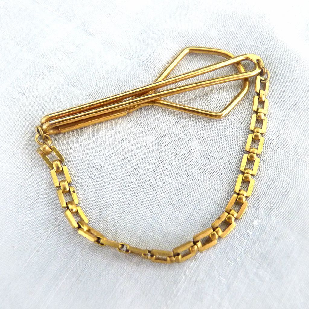 Swank tie clip with chain patented c. 1940s from victoriascurio on Ruby