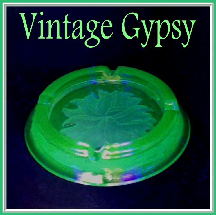 Vintage Lavender Glass Ashtray with Intaglio Cut Floral in Bottom Vintage Lavender Glass Ashtray with Intaglio Cut Floral in Bottom