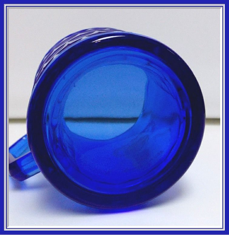 Hazel Atlas Milk Pitcher Cobalt with Shirley Temple on Front, c. 1930's Hazel Atlas Milk Pitcher Cobalt with Shirley Temple on Front, c. 1930's
