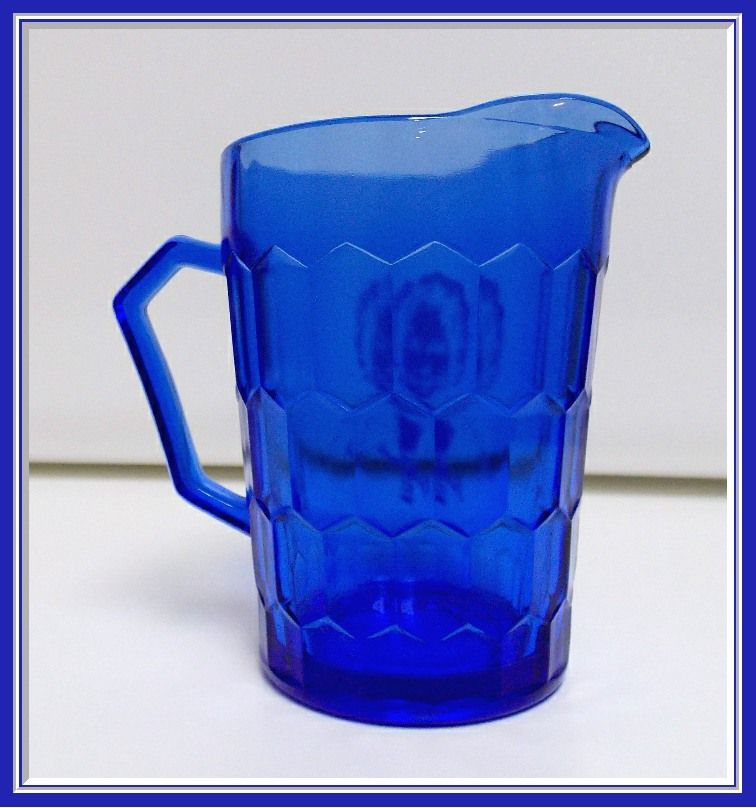 Hazel Atlas Milk Pitcher Cobalt with Shirley Temple on Front, c. 1930's Hazel Atlas Milk Pitcher Cobalt with Shirley Temple on Front, c. 1930's
