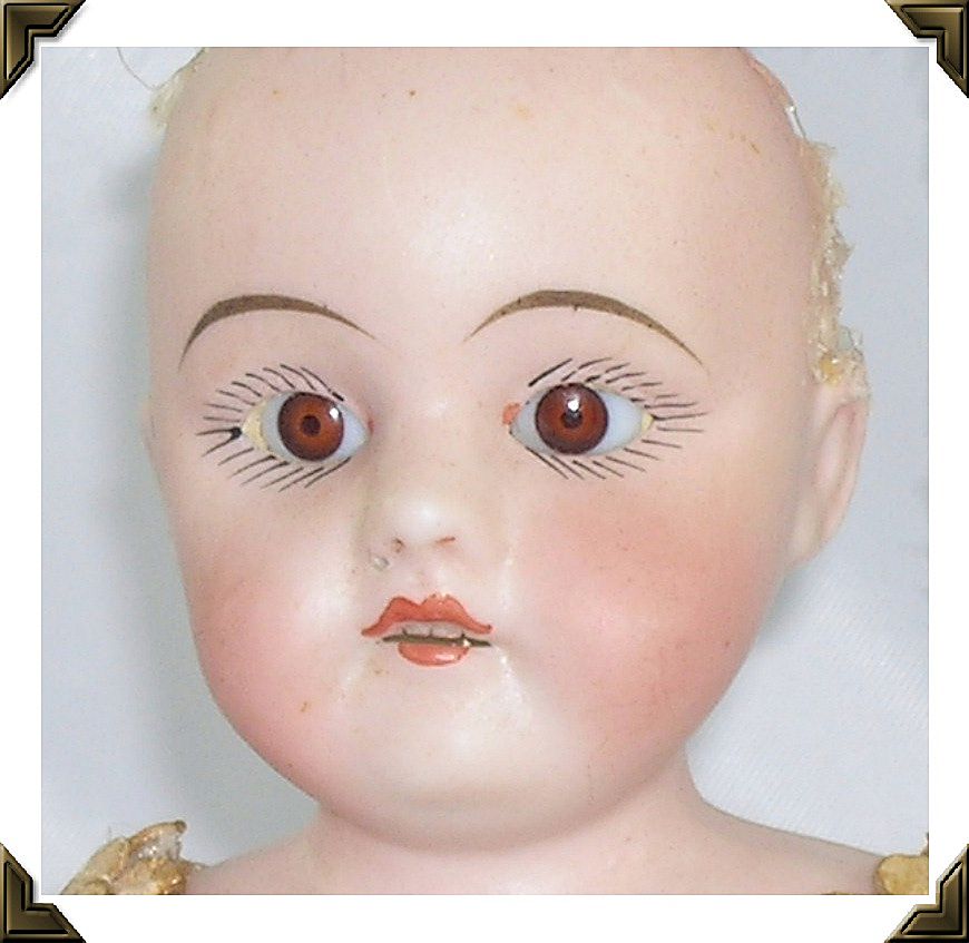 Antique German Bisque Shoulder Head Doll Leather Jointed Body 11" Tall Antique German Bisque Shoulder Head Doll Leather Jointed Body 11" Tall