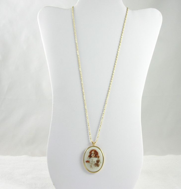 Vintage NOS Pendant Necklace Porcelain Stone Child/Doll Portrait Vintage NOS Pendant Necklace Porcelain Stone Child/Doll Portrait