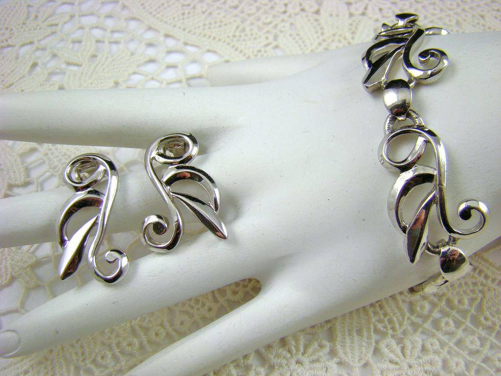 Bergere Rhodium Plated Bracelet and Earrings Bergere Rhodium Plated Bracelet and Earrings