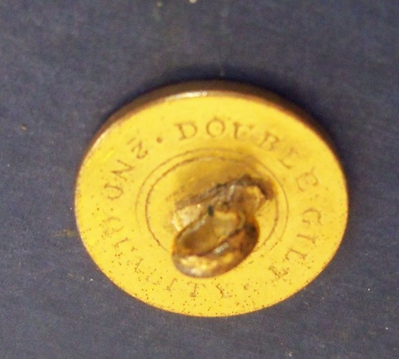 Button gilt with floral spray Button gilt with floral spray