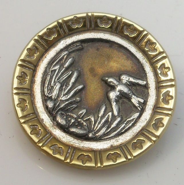 Brass two piece button bird in flight Brass two piece button bird in flight