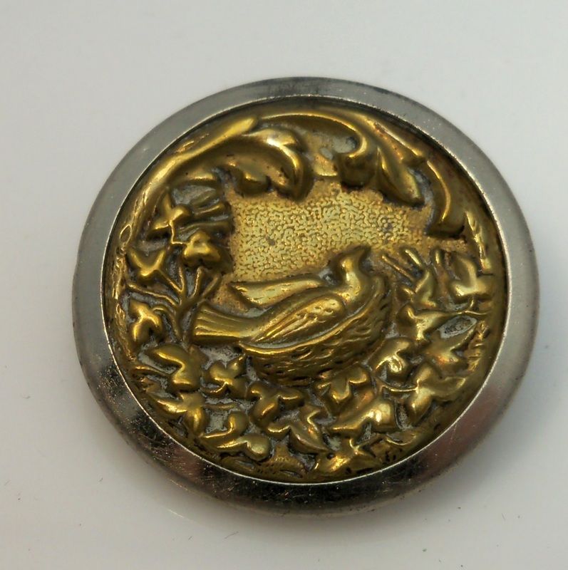 Brass and Silver Metal "Bird Sitting on Nest" Button Brass and Silver Metal "Bird Sitting on Nest" Button