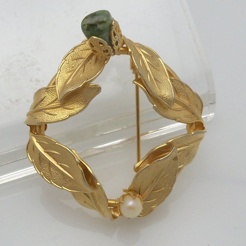 Gold Metal Brooch with Leaf Design and Imitation Pearl and Polished Rock Gold Metal Brooch with Leaf Design and Imitation Pearl and Polished Rock