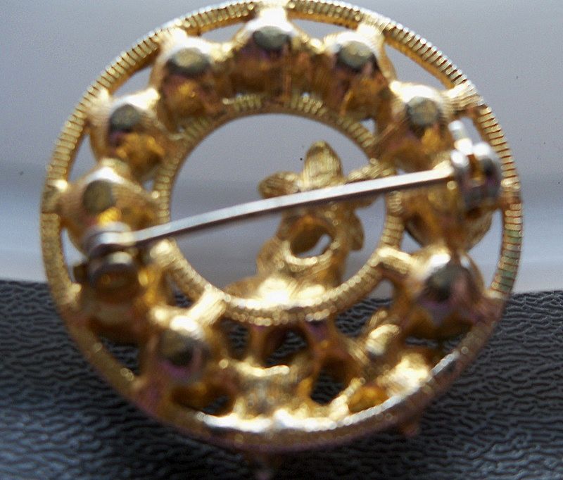 Dramatic Gold Metal Circle Pin with Rhinestones Dramatic Gold Metal Circle Pin with Rhinestones