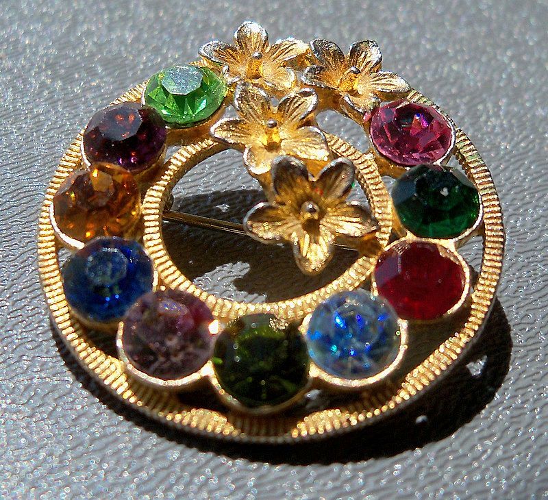 Dramatic Gold Metal Circle Pin with Rhinestones Dramatic Gold Metal Circle Pin with Rhinestones