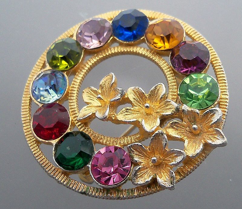 Dramatic Gold Metal Circle Pin with Rhinestones Dramatic Gold Metal Circle Pin with Rhinestones