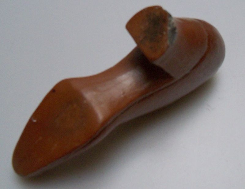 Brown Ladies Shoe Sewer Tile Brown Ladies Shoe Sewer Tile