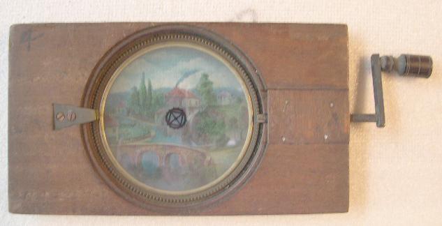 A Mid 19th C Hand Painted Moving Lantern Slide of a Watermill A Mid 19th C Hand Painted Moving Lantern Slide of a Watermill