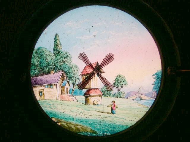 A Mid 19th C Hand Painted Moving Lantern Slide of a Windmill A Mid 19th C Hand Painted Moving Lantern Slide of a Windmill