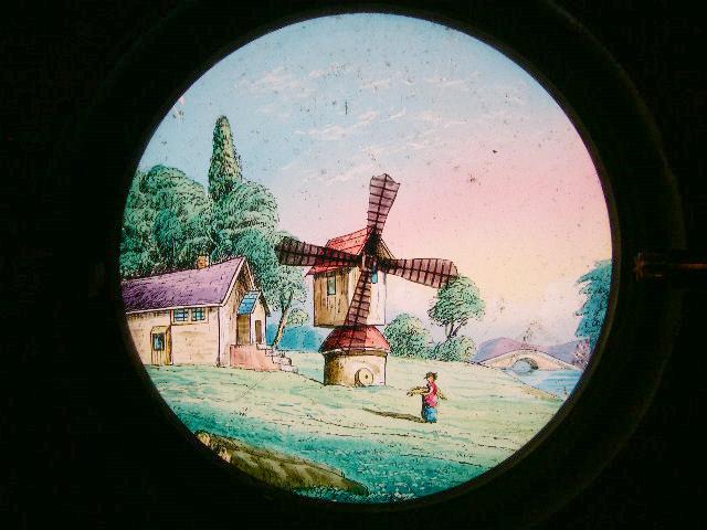 A Mid 19th C Hand Painted Moving Lantern Slide of a Windmill A Mid 19th C Hand Painted Moving Lantern Slide of a Windmill
