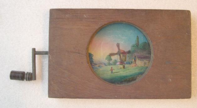 A Mid 19th C Hand Painted Moving Lantern Slide of a Windmill A Mid 19th C Hand Painted Moving Lantern Slide of a Windmill