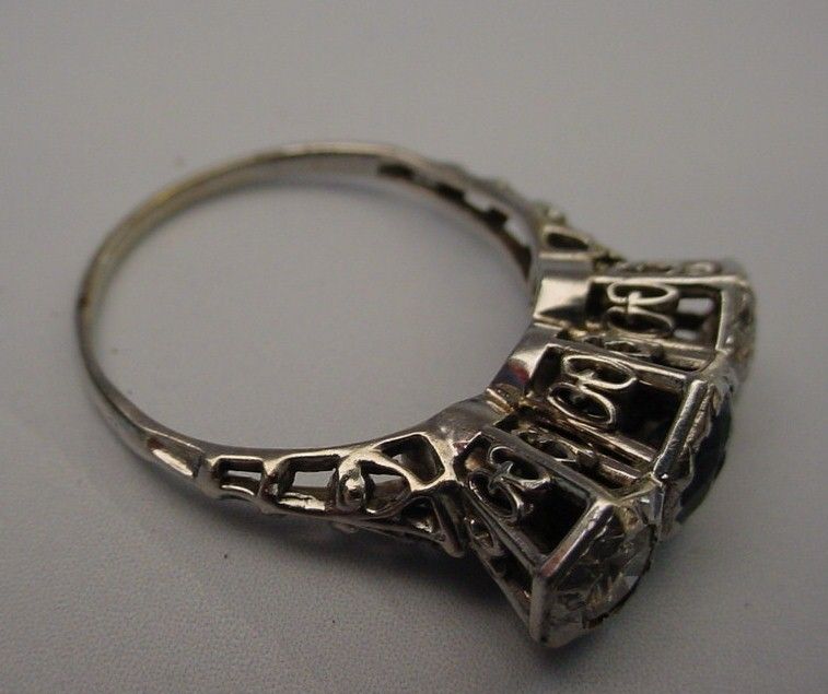 Exquisite 18 Karat White Gold Filigree Diamond and Sapphire Ring Exquisite 18 Karat White Gold Filigree Diamond and Sapphire Ring