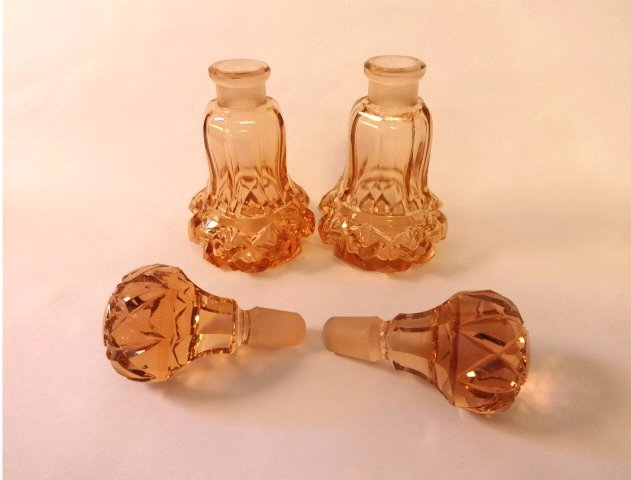 Pink Cut Glass PAIR Perfume Bottles Made in Germany Pink Cut Glass PAIR Perfume Bottles Made in Germany