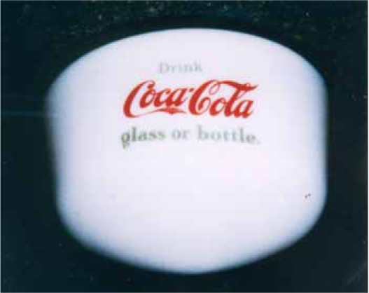 Coca-Cola glass cup filled with coke, World of Coca-Cola Papua New