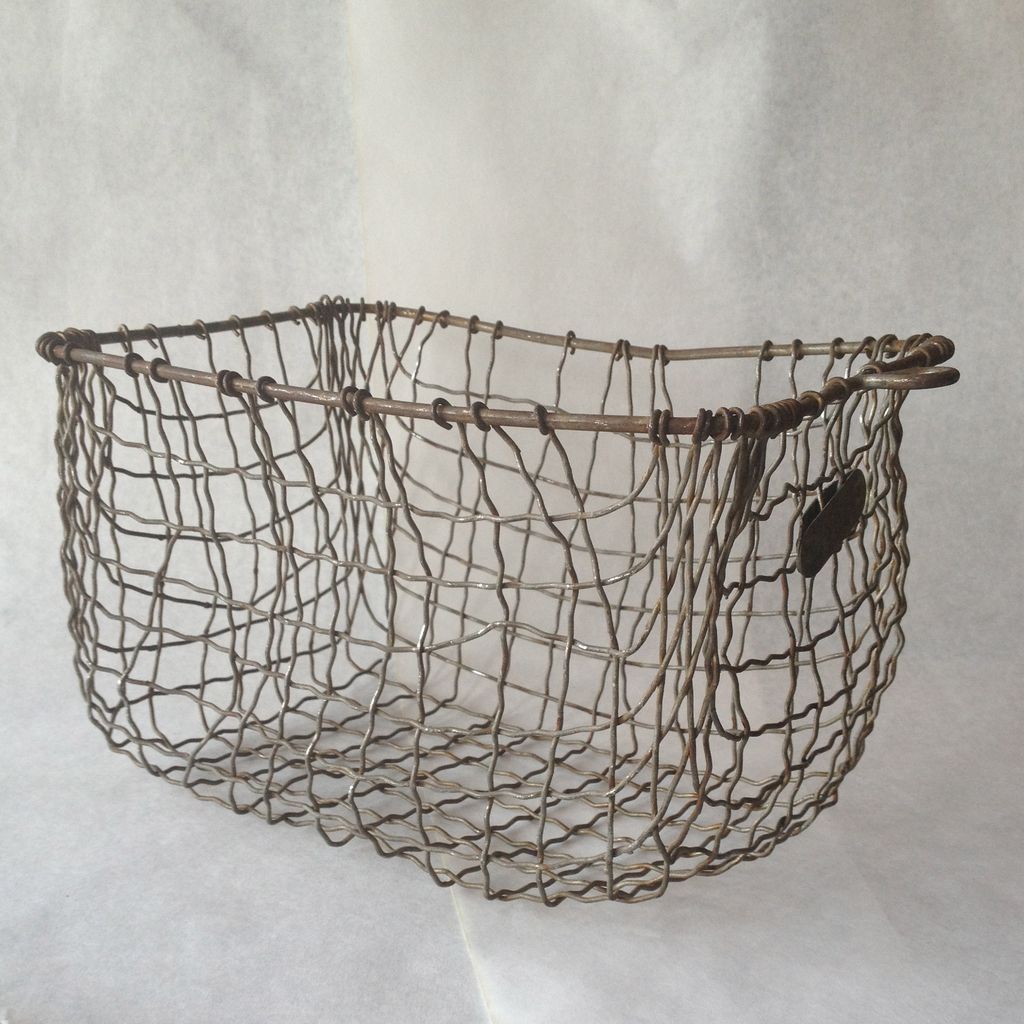 Metal Wire Storage Basket from paulcorrieinteriorshome on Ruby Lane