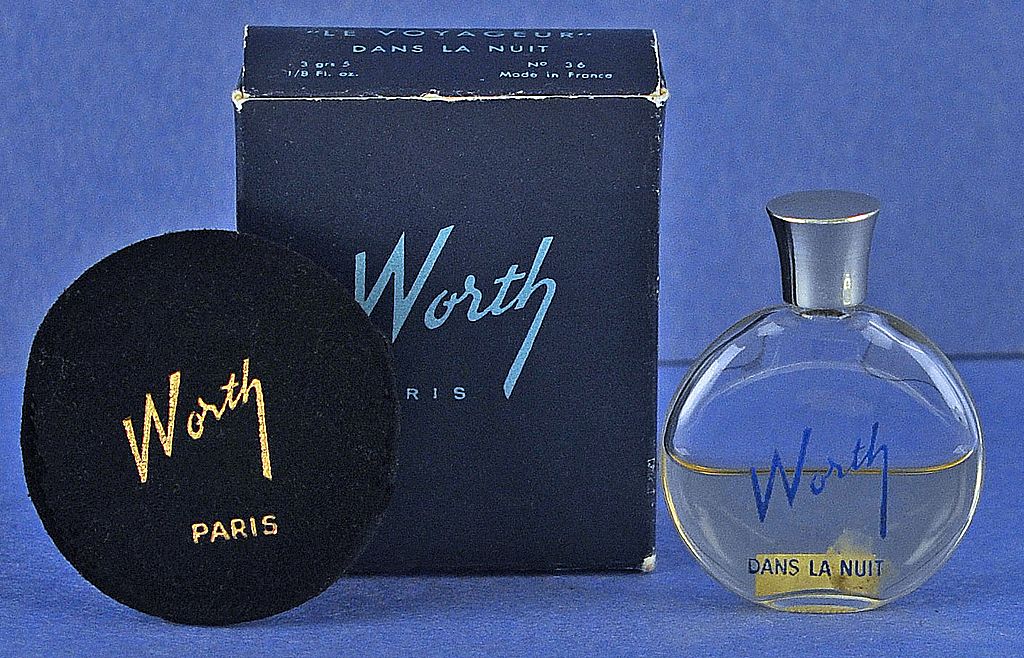 worth perfume blue bottle